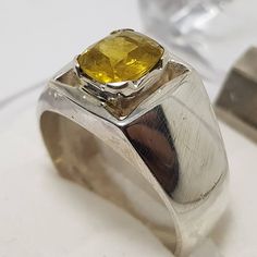 Special Low price offer Guaranteed shipping in 3 Days. ( 5 Woking Days for Delivery Minimum ) Unheated Untreated beautiful Yellow Sapphire pukhraj Handmade Premium 925 Sterling Silver Ring Dark Deep Color yellow Sapphire from Ceylon Sri Lanka Stone Weight is 2.25 Carats Stone Shape is oval cut Ring size 11 US Resize able as per buyer choice great Color and luster mostly transparent FedEx Shipping option I do ship the item in Same working day Contact me in case of any question about the item Pukhraj Ring, Coral Stone Ring, Mens Sapphire Ring, Yellow Sapphire Ring, Yellow Sapphire Rings, Oval Cut Ring, Sapphire Rings, Ceylon Sapphire, Price Offer