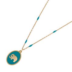 The Powerful & Lucky Elephant Gold & Turquoise Chain Necklace is a testament to the harmonious blend of elegance and symbolism. It's a reflection of the gentle strength within you and a reminder of the majestic beauty that surrounds us. Crafted with meticulous attention to detail, this necklace features a sterling silver chain luxuriously coated with 18K gold plating. The turquoise enamel chain adds a pop of color reminiscent of clear skies and tranquil waters, infusing the necklace with a sense of calm and serenity. Whether you wear it to channel the energies of the spirit elephant, express your individuality. Details 18K gold plated on sterling silver Turquoise enamel Necklace length 18" and 2'' extender Pendant height 0. 7'' Pendant width 0. 6'' Avoid contact with chemicals, makeup, per Blue Pendant Necklace With Cable Chain, Blue Cable Chain Necklace For Gifts, Symbolic Blue Round Pendant Necklace, Symbolic Blue Necklace With Round Pendant, Blue Round Cable Chain Necklace, Luxury Blue Oval Pendant Necklace, Dad Jewelry, Lucky Elephant, June Birthstone Jewelry