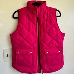 J. Crew Women’s Dark Pink Quilted Puffer Vest Small. Brand New With Tags. Zip Front, Snap Pockets And Side Slash Pockets. Dark Pink Color Is Called “Bold Hibiscus”. To Me It Looks Kind Of Like A Raspberry Color. Not Quite As Bright As A Typical Hot Pink. Can Look Different On Each Screen. I Took Photos In All Different Lighting To Try And Help. Runs A Little Big, See Photos For Measurements. Fast Shipping! Herringbone Quilt, Dark Pink Color, Vest Layering, Herringbone Vest, Lightweight Vest, Pink Vest, J Crew Women, Quilted Puffer Vest, Pink Quilts