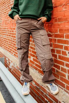 Step up your athletic game this with these Love Tree Baggy Cargo Pants for Women in Brown. These pants feature a comfy parachute design, elastic waistband, and cargo pockets to keep you comfortable all day long. These are going to be your new favorite pair of pants! Features: Love Tree Style: 6870PN-TRUFFLE Color: Truffle Brown 100% Nylon Women’s pants Zipper and button fly Belt loop Elastic back waistband Hand pockets Double cargo pockets Fake pocket flaps Adjustable toggles at hem of each pant Yellow Blazer Outfits, Brown Cargo Pants Outfit, Yellow Blazer Outfit, Parachute Design, Fall Style Inspiration, Cargo Pants For Women, Outfits For Spring, Brown Cargo Pants, Yellow Blazer