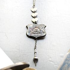 Shieldmaiden Sun Shield Armor Pendulum Spike Necklace Shield Armor, Shield Necklace, Dragon Bloodstone, Libra Pisces, Wire Wrap Necklace, Art Necklace, Shield Maiden, Spike Necklace, Art Necklaces