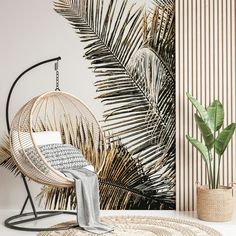 a chair and rug in front of a wall with palm leaves