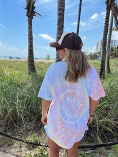 HAPPY DAYS TIE DYE SMILEY T☻ Available in short sleeve or long sleeve. Brand is Comfort Colors :) Hand-dyed & hand-made to order! Playful Tie Dye Short Sleeve T-shirt, Playful Tie-dye Short Sleeve T-shirt, Playful Tie Dye Tops For Summer, Tie Dye Crew Neck Top For Beach, Tie-dye Crew Neck Tops For The Beach, Fun Tie Dye Crew Neck Top, Hippie Tie-dye Crew Neck Top, Tie Dye Short Sleeve Vacation T-shirt, Fun Tie-dye Pre-shrunk Top