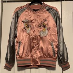 Large Shiny Pink & Gray Embroidered Jacket. Embroidery Has Birds On The Jacket. Never Worn Trendy Pink Embroidered Outerwear, Spring Long Sleeve Outerwear With Embroidered Graphics, Pink Embroidered Casual Outerwear, Casual Pink Embroidered Outerwear, Spring Pink Outerwear With Floral Embroidery, Casual Pink Outerwear With Floral Embroidery, Pink Floral Embroidered Outerwear For Spring, Pink Outerwear With Floral Embroidery For Fall, Pink Embroidered Outerwear For Fall