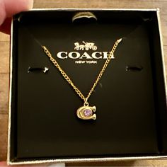 Brand New Without Tags And Absolutely Gorgeous Describes This Authentic Coach Dainty Pink Crystal C Pendant Beautifully Displayed On This Genuine 18k/.925 Necklace. Necklace Measures 18” In Length Lobster Claw Clasp. Please Note That The Coach Gift Box Is Used For Pictures And Display And Is Not Included! Black Velvet Drawstring Dust Bag Will Be Provided! Gold Coach Necklace, Coach Round Jewelry For Anniversary, Coach Necklace With Adjustable Chain For Gift, Coach Necklace With Adjustable Chain As Gift, Pink Necklaces For Birthday Gift, Coach Gold Jewelry For Anniversary, Gold Coach Jewelry For Anniversary, Elegant Coach Sterling Silver Jewelry, Coach Rose Gold Jewelry For Gifts