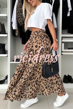 Details Size Chart This extraordinary leopard print skirt combines trendy graphics with unparalleled comfort. The elasticated waistband hugs the figure perfectly, emphasizing the waist and adding lightness to the entire look. This skirt adds a touch of pizzazz to any look while keeping you comfortable and stylish in any situation.   Length: Ankle-Length Material: Polyester Elastic Waist Style: Vacation / Casual Wear Fit Style: Loose Fit @Note: Size: please check measurements carefully Please allow 0.5-1" difference due to manual measurement Different monitor settings means colors may differ slightly 1" = 2.54cm @ Size(inch) Waist Bottom length S 26 41.5 M 28 42 L 30 42.5 XL 42 43 Summer Party Skirt, Layered Maxi Skirt, Animal Print Maxi Skirt, Trendy Graphics, High Waist Long Skirt, Leopard Print Skirt, Perfect Figure, Print Skirt, Fit Style