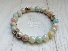 This Mystic Amazonite Natural Gemstone Mala Bracelet is made with gorgeous micro-faceted mystic coated amazonite beads, accented with a lovely trio of rose gold, silver, and gold metal spacers, also available with a quad of silver spacers. This bracelet is comfortable and stretchy, so you won’t ever have to worry about clasps or fastenings. Features: Natural Gemstone Bracelet Made with genuine gemstones Threaded using a highly durable elastic cord material Self Discovery. Amazonite, known as the Stone of Hope, is helpful for anything that may take energy away from a person. A stone of truth, honor and trust, it can increase intuitive wisdom and improve communication. A powerful Throat Chakra stone, Amazonite helps you move beyond the fear of confrontation or judgment so you can freely purs Intention Bracelets, Awareness Jewelry, Instagram Jewelry, Improve Communication, Mala Bracelet, Throat Chakra, Special Jewelry, Chakra Stones, Ankle Bracelets