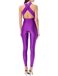 Hola Jumpsuit By The Andamane. Featuring: Halterneck Cut-out Detail In Front Open Back Slim Fit Model Is 1,72 M And Wears Size S Composition: 80% polyamide, 20% elastane | The Andamane Women's Hola Jumpsuit in Purple | SS24 Catsuit, Luxury Retail, Italian Fashion, S Models, Luxury Boutique, Front Open, Open Back, Christian Louboutin, Wrap Dress