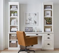 a chair sitting in front of a white desk