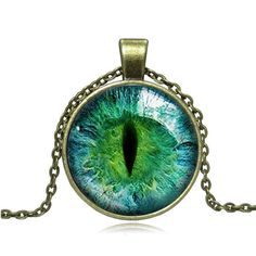 PRICES MAY VARY. 【Magic Eyes】:Various animal time gemstone eye necklaces, bracelets and earrings，unique stylish women's long sweater chain necklace for fashion Christmas jewelry gifts. 【Product Dimension】: Pendant bottom diameter :2.8cmx3.6cm, glass patch diameter :2.5cm;chain length :45cm + 5cm. 【Main Material】: Alloy + Glass piece 【Best Gift】:Perfect gift is simple, unique, beautiful, Absolutely a great gift to express your love for your mother, girlfriend, fiancee, wife, valentine, family or Collar Verde, Green Cat Eye, Cat Eye Necklace, Dragon Cat, Eye Pendant Necklace, Green Cat, Vintage Dragon, Crystal Jewelry Sets, Dragon Necklace