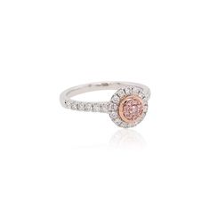 For Sale on 1stDibs - This beautiful ring is featured by Argyle Pink Diamonds and White Diamonds set in PT900 platinum and 18 Karat pink gold. It holds connotations of romance Elegant Pink Diamond Ring In Platinum, Luxury Pink Rings With Pave Setting, Fine Jewelry Pink Diamond Ring In Platinum, Fine Jewelry Pink Diamond Ring With Pave Setting, Pink Diamond Ring With Pave Setting, Luxury Pink Halo Ring For Wedding, Luxury Pink Rings With Brilliant Cut, Pink Cluster Ring With Brilliant Cut, Platinum Pink Rings With Halo Setting