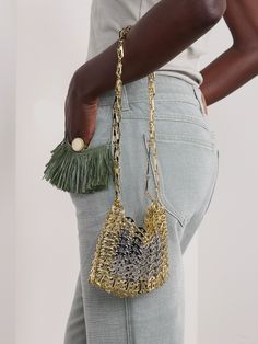 Rabanne's bag is the miniature version of the iconic '1969' style - it feels just as modern and fresh today as when it debuted 50 years ago. It's made from silver and gold-tone chainmail with a high shine and 'PR' discs along the strap. Wear it cross-body to hold your champagne flute or camera at parties. Rabanne Bag, Raffia Bag, 50 Years Ago, Iconic Style, Essential Items, Chain Mail, Bag Light, Paco Rabanne, Phone Wallet