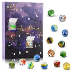 a calendar with marbles in front of it and an image of the planets around it