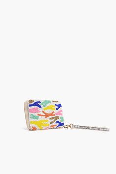 Our Rainbow Sprinkles Wallet is an elegant and versatile accessory designed to seamlessly blend style and functionality. This sophisticated Wallet is not just a fashion statement; it's a practical solution that combines a top zip compartment with an integrated wallet for all your essentials.The top zip closure provides a secure and convenient way to access your belongings. Keep your essentials safe and organized with easy access to the main compartment Hand Embellished with Top Zip Clutch Made i Modern Clutch Wallet With Zipper Closure, Modern Clutch Wallet With Zipper Pocket, Trendy Coin Purse With Zipper Closure, Trendy Bifold Coin Purse With Zipper Closure, Modern Rectangular Wallets With Zipper Closure, Trendy Travel Wallets With Zipper Closure, Trendy Travel Wallet With Zipper Closure, Modern Compact Wallet With Zipper, Trendy Compact Coin Purse With Zipper