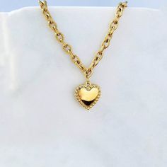 "The Oh My Heart Necklace is a gorgeous statement handmade piece made of 18k gold plated stainless steel, this unique necklace can be used as a statement piece for an effortless look or can be layered with other necklaces. ITEMS DETAILS: Water Resistant - Tarnish-free - Skin Friendly Material: 18k gold layer over stainless steel Length 18¨ + 2\" extender chain Adjustable Jewelry Care We at Alma Libre Jewelry understand that every person is different and we each have unique skin-oils that may rea Chunky Gold Necklace, Chunky Gold Necklaces, Oh My Heart, Necklace Chunky, Adjustable Jewelry, Gold Heart Necklace, Unique Necklace, Necklace Statement, Gold Heart