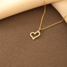 Gold Tiny Heart Necklace, Open Heart Shaped Charm Pendant, Solid Gold Heart Pendant, Women's Dainty Heart Charm, Pendant Gift For Girlfriend 🎁 Free Express Shipping 🎁 Free Personalization (Engraving) 🎁 Free Gift Wrap Free shipping to all over the world. Delivery to USA within 1-3 business days. Express shipping to Europe within 2-4 business days. ► Custom order requests are welcome Solid Gold (real gold, no gold-filled or no gold plated material) Gold Karat: 14K (585)   Gold Color: Yellow Gol Tiny Heart Necklace, Gold Heart Pendant, 16 Inch Necklace, Heart Pendant Gold, Tiny Heart, Gift For Girlfriend, Open Heart, Gold Heart, Heart Of Gold