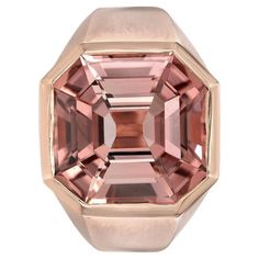 Magnificent 18K rose gold ring set with a supreme 7.76 carat Peach Tourmaline square octagon. Matte finish. Ring size 6. Resizing is complementary upon request. Crafted by extremely skilled hands in the USA. Returns are accepted and paid by us within 7 days of delivery. Luxury Octagon Ring With Bezel Setting, Formal Rose Gold Octagon Jewelry, Formal Rose Gold Octagonal Jewelry, Luxury Octagon Faceted Ring, Luxury Rose Gold Square Cut Ring, Luxury Rose Gold Asscher Cut Ring, Octagon Rose Gold Ring For Formal Occasions, Rose Gold Octagon Ring For Formal Occasions, Luxury Rose Gold Octagon Ring