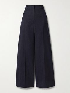 Stella McCartney's Savile Row training is clearly evident with these impeccable pants. They're cut from wool-twill with a high rise and fit slim through the waist before flaring out to pleated wide legs. Wear yours with the matching blazer and a silk shirt. Stella Mc, Exclusive Dress, Sports Skirts, Savile Row, Tapered Pants, Looks Chic, Wool Pants, Wide Legs, Pull On Pants