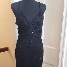 Black Gorgeous Long Beaded Gown. Still Has Tags On It. Fits Much Smaller. Elegant Sequin Dress With Beaded Straps For Night Out, Elegant Evening Sequin Dress With Beaded Straps, Elegant Sequin Dress With Beaded Straps For Evening, Beaded Evening Dress For Night Out, Beaded Floor-length Dress For Night Out, Sleeveless Beaded Sequin Dress For Evening, Black Prom Dress With Beaded Straps, Glamorous Beaded Evening Dress For Night Out, Black Beaded Evening Dress For Night Out