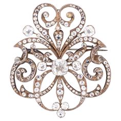 Fantastic Oversized antique French brooch. A very nice early French piece, created during the Georgian period, around the 1810's. Carefully crafted in solid .830/1000 sterling silver and suited at the reverse, with a hinged horizontal pin with a hook lock. Is embellished, with a mix of larger quartz gems cuts and small simulated gemstones in paste. Excellent workmanship with black dots and prong set on top of the silver with open backs. Paste, is a gem like material made from a secret formula of Antique Wedding Jewelry, Paste Jewelry, Early French, Antique Brooches, Art Nouveau Jewelry, Retro Jewelry, Rings Cool, Victorian Jewelry, Art Deco Jewelry