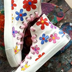 "⭐ FREE SHIPPING ⭐ Step into the world of art with these flower painting high top sneakers! Perfect for teen girls with a love for creativity, these sneakers make for a great gift idea for a daughter's birthday or for a niece's special occasion. These artistic sneakers not only offer a unique and personalized touch but also offer both comfort and style for any casual occasion, whether it be a teen girls' trip or a day out with friends. Available in a range of shoe sizes for both kids and adults, Cute White High-top Sneakers For Spring, Spring Hand-painted High-top Sneakers, Spring High-top Hand Painted Sneakers, Artistic White Sneakers For Spring, Artistic Multicolor Spring Sneakers, Artsy White High-top Sneakers, Funky High-top Sneakers For Spring, Trendy Multicolor High-top Sneakers For Spring, Hand Painted Pink Sneakers For Spring