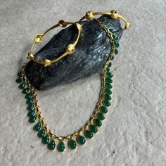 Exquisite! Limited Edition! A wondrous design, a remarkable creation!! 16 inches long, this choker necklace flaunts green onyx, 6 x 9 pear-shaped cabochon ( weighs 48.40cts /35pcs) so beautifully that one may keep staring at it. As you know, cabochon gemstones generally have a smooth, domed top surface and a flat base which further makes the jewelry design more stylish. Green onyx is Green Onyx's hue that represents your mental strength and intellect. Furthermore, it will improve your awareness, Mental Strength, Onyx Gemstone, Green Onyx, Pear Shaped, Onyx, Choker, Pear, Choker Necklace, Jewelry Design