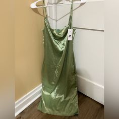 Satin With Cowl Neck And Adjustable Spaghetti Straps. Never Worn! Just Needs To Be Steamed Party Sundress With Cami Suspender, Party Sundress With Suspender Cami Shape, Party Cami Suspender Sundress, Casual Midi Suspender Dress For Party, Casual Midi-length Suspender Dress For Party, Casual Midi Length Suspender Dress For Party, Green Midi Party Dress With Spaghetti Straps, Green Midi Dress With Spaghetti Straps For Party, Green Fitted Mini Suspender Dress