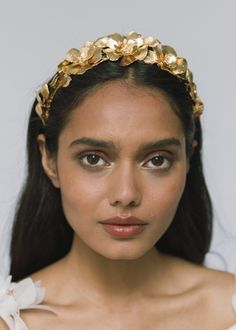 Each Rowena Headband is constructed by hand in our Brooklyn sudio, so each one is one-of-a-kind and no two are entirely alike. Featuring a combination of golden blooms and life-like foliage, the Rowena evokes an ethereal, Grecian mood, and can be worn atop the head like a headband, or in the back of the head, framing an up-do or loose waves. For the perfect wearing, wear this headband with the coordinating Rowena Earrings. Dimensions: 6.75 x 6 inches, 1.5 inches height Weight: 97g Jennifer Behr Bridal, Bridal Floral Headpiece, Pearl Bridal Headband, Luxury Hair Accessories, Chic Brides, Back Of The Head, Helena Christensen, Jennifer Behr, Alicia Keys