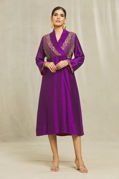 Purple dress kurta in organic silk base with bells sleeves, shawl collar, floral motifs, zardozi, sequins, beads, cutdana, kasab, resham and cotton thread hand embroidery. Comes with a matching mask.
Components: 2
Pattern: Hand Embroidered
Type Of Work: Floral
Neckline: Shawl Collar
Sleeve Type: Bell
Fabric: Organic silk
Color: Purple
Occasion: Mehendi and Haldi - Aza Fashions Eid V-neck Kurta With Intricate Embroidery, Festive Semi-stitched Silk Embroidered Dress, Elegant V-neck Kurta For Festive Occasions, Traditional Long Sleeve Embroidered Dress For Reception, Elegant V-neck Anarkali Set With Resham Embroidery, Bollywood Style Embroidered Dress For Diwali Reception, Bollywood Embroidered Dress For Diwali Reception, Elegant Embroidered Dress For Diwali Reception, Festive V-neck Dress With Resham Embroidery