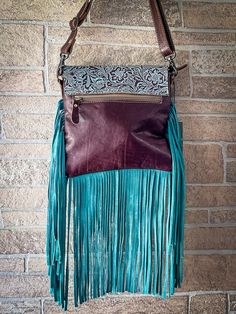 With sprinkles of turquoise frills complementing the earthy brown, this bag will look perfect with boho outfits. Cowhide will vary. No two bags will be the same. You may or may not receive the image example shown. Please contact us if you're looking for a specific cowhide. Materials LEATHER + HAIRON LEATHER Item Width 9.5 Item Height 9 Shoulder 22 Earthy Brown, Leather Items, Boho Outfits, No Frills, Bag Sale, Sprinkles, Turquoise, Leather