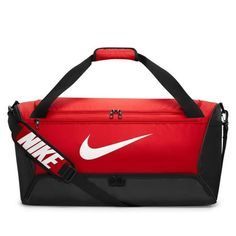 the nike duffel bag is red and black with white logo on the front side