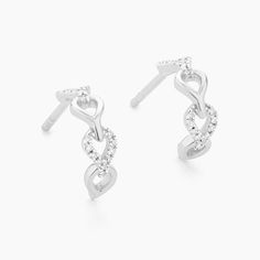 SKU# E-10742 Diamond Weight 0.05cts Earrings Height 10.50 mm Width 4.10 mm. Post back closure Finish 14k gold plated sterling silver or in sterling silver. Avoid contact with anything containing derivatives of alcohol. Silver Round Cut Tarnish-resistant Earrings, Silver Tarnish Resistant Earrings, Silver Tarnish-resistant Round Cut Earrings, Classic Silver Tarnish Resistant Diamond Earrings, Classic Silver Tarnish-resistant Diamond Earrings, Formal Tarnish-resistant Sterling Silver Diamond Earrings, Timeless Sterling Silver Pierced Diamond Earrings, Timeless Hallmarked Sterling Silver Diamond Earrings, Affordable Earrings