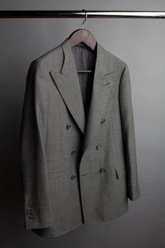 Our best-seller. A handmade bespoke suit crafted from an iconic 4-season worsted wool fabric made in Italy. This fabric is known as the ultimate "workhorse"; it's durable, resilient and can be worn in any season and any weather. If you're looking for a go-to suit that's always ready for anything, anytime - this is it. Classic Three-piece Fall Suit, Classic Winter Suit With Custom Fit, Classic Winter Suits In Suiting Fabric, Timeless Fitted Wool Sport Coat, Timeless Winter Suits In Suiting Fabric, Classic Custom Fit Winter Suit, Bespoke Wool Suit With Notch Lapel, Bespoke Wool Notch Lapel Suits, Timeless Wool Suit And Tie Accessories For Semi-formal Occasions