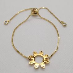 "This lovely Bracelet will show off your Filipino Pride.  Great Gift! Item: Filipino Sun Bracelet Sun Size: .75\" Bracelet Size: Adult Color: Gold Material: Stainless Steel/Gold Plated Hypoallergenic finish" Adjustable Gold Star Chain Bracelet, Adjustable Gold Star-shaped Chain Bracelet, Star-shaped Metal Bracelets As Gifts, Adjustable Star Shaped Metal Bracelets, Adjustable Metal Star Bracelet, Adjustable Star-shaped Metal Bracelets, Adjustable Star-shaped Metal Bracelet, Dainty Adjustable Charm Bracelet With Extender, Dainty Charm Bracelet With Extender