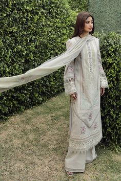 Brand: QalamkarProduct Code: PS-11 RINNAHCollection: Qalamkar Unstitched Festive Lawn CollectionFabric: Lawn DESIGN DETAILS: Shirt Laser Cut Embroidered (Front Center Panel) Chikan kari Embroidered (Front Side Panels) Embroidered hem (Front Center) Embroidered Front Neckline Embroidered Border (Front, Back & Sleeves) Embroidered Lace (Front ,Back & Sleeves) Embroidered Patch (Front & Back) Chikan kari Embroidered Back Chikan kari Embroidered Sleeves Embroidered Border (Sleeves) Dupatta Digital Printed Silk Dupatta Trouser Plain Trosuer Fabric Details Shirt : Lawn Dupatta :Silk Trouser : Cotton DISCLAIMER:* Lining, Laces, and Tassels are not included in unstitched variants.* Embellishment items in stitched outfits are subject to market availability.* The actual colors of the outfit may vary Pakistani Clothes Online, Sajal Ali, Eid Dresses, Embroidered Sleeves, Embroidered Border, Lace Side, Lawn Suits, Embroidered Neckline, Pakistani Dress Design