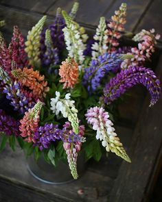 a bunch of flowers that are in a vase