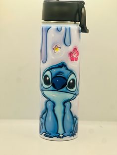 a water bottle with a cartoon character painted on it