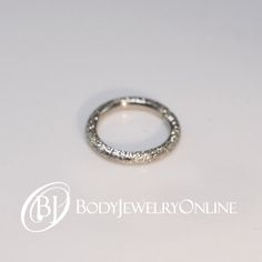 Please message us if you need help choosing a gauge or inside diameter! As a general rule, the thicker the gauge, the more noticeable the sparkle. LOOKING FOR A DIFFERENT GAUGE? Click here! WE LOVE THESE!!! This ring is made with a multistage, unique technique, resulting in tiny divots which catch and reflect the light Nose Ring Diamond, Types Of Diamond Cuts, Types Of Diamonds, Platinum Jewelry, Nose Hoop, Ring Diamond, Diamond Fashion, Tragus, Gold Hoop