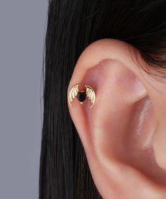 Bedeck your lobes with devilish delight with our cool Devil Heart Stud earrings. Featuring a chic black gemstone, these spooky studs are perfect for Halloween (or any other time you're feeling wickedly stylish). Detail： -Post material: stainless steel. Cubic Zirconia -Gauge: 20g | 0.8mm-Post length: 6mm -Dimensions: 7mm Length x 8.1mm Width -Include: single item -Closure: screw ball back * Shop extra ball backing here. * Piercings are sold individually for layering purposes. Sold individually. M Black Piercings For Halloween Gift, Edgy Black Body Jewelry For Gift, Edgy Black Body Jewelry For Gifts, Black Punk Cartilage Earrings Internally Threaded, Black Internally Threaded Punk Cartilage Earrings, Punk Black Internally Threaded Cartilage Earrings, Black Punk Internally Threaded Cartilage Earrings, Black Internally Threaded Metal Cartilage Earrings, Nickel Free Black Metal Piercings