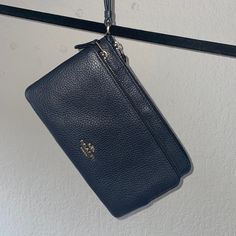 Basically Brand New, Navy Coach Wristlet With Two Pockets To Fit Cards And Other Misc Stuff. Great Condition. 8.5” X 5” Elegant Blue Clutch With Zipper Closure, Blue Elegant Wristlet For Everyday Use, Elegant Blue Pouch Wristlet, Elegant Blue Wristlet For Everyday Use, Bike Messenger Bags, Bag Pins, Asics Running Shoes, Brown Tote, Red Handbag