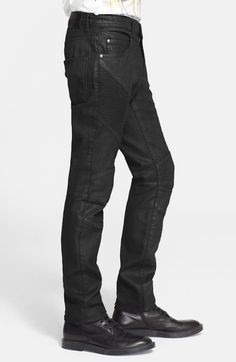 Find PIERRE BALMAIN Coated Moto Jeans on Editorialist. Coated black stretch denim is tailored into a pair of slim moto pants accented with ribbed panels and articulated knees for a heavy dose of throttle-twisting swagger. Zip fly with button closure. Five-pocket style. 98% cotton, 2% elastane. Machine wash cold. By Pierre Balmain; made in Italy. Men's Designer. Moto Style Fitted Jeans For Biker Events, Moto Style Fitted Straight Leg Jeans, Fitted Moto Style Straight Leg Jeans, Fitted Black Jeans For Biker Events, Balmain Coat, Balmain Jeans, Moto Pants, Latest Jeans, Moto Jeans