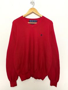 This sweater remains in pre owned condition. Measurements  Pit to pit: 24 inches Top to bottom: 26 inches Classic Red V-neck Long Sleeve Sweater, Red Pullover Sweater, Mens Pullover, Red Pullover, Polo Golf, Pullover Men, Cotton Knit, Pullover Sweater, Pullover Sweaters