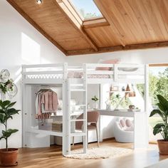 a white loft bed sitting under a window next to a potted plant in a living room