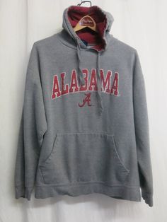 "Crimson Tide Hoodie Sweatshirt Gosh knows how this ended up here in NorCal! University of Alabama College Hoodie OVD Old Varsity Brand Very thick and plush! Front pocket This is so cool, one paint mark on underarm arm Large Cotton/Polyester  24\" shoulder 50\" chest 27\" length A real collectible! Cozy too! https://www.etsy.com/shop/BelindasStyleShop" Collegiate Hooded Tops For Sports Season, Fan Gear Hooded Top With Letter Print, Hooded Tops For Game Day In Winter, Fan Gear Hoodie, Hooded Winter Tops For Game Day, Collegiate Hooded Sweatshirt For Game Day, Game Day Long Sleeve Fan Apparel Hoodie, Game Day Fan Apparel Hoodie With Long Sleeves, Fan Apparel Hoodie With Double-lined Hood