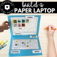 a child's hand is drawing on a paper laptop