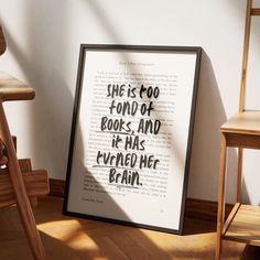 a framed book page with the words she is too fondd of books and it has even her brain