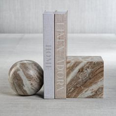 two bookends sitting next to each other on a table