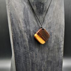 "Prices given are total prices. VAT is not shown due to small business status according to § 19 UStG." A charming pendant, with a leather or cotton cord chain. For this absolutely natural and beautiful pendant, I used a piece of fine real wood that grew in two colors. The wood is natural and not stained, has been painstakingly sanded and polished by hand. This is the perfect piece of jewelry for all nature lovers. YOU CAN NOW ALSO HAVE THIS PENDANT PERSONALIZED WITH AN ENGRAVING TO MAKE YOUR JEW Handmade Square Pendant Jewelry For Everyday, Unique Personalized Round Pendant Necklaces, Handmade Brown Square Pendant Jewelry, Handmade Artisan Necklaces For Everyday, Handmade Brown Rectangular Jewelry, Handmade Rectangular Everyday Necklace, Artisan Square Pendant Necklace For Jewelry Making, Handmade Natural Jewelry For Everyday, Everyday Artisan Handmade Necklaces