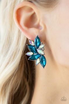 Infused with dainty white rhinestones, a stellar display of blue and iridescent marquise cut rhinestones fan out into a spectacular centerpiece. Earring attaches to a standard post fitting.

 Sold as one pair of post earrings. Paparazzi Jewelry Images, Mobile Boutique, Black Image, Paparazzi Accessories, White Rhinestone, Blue Jewelry, Paparazzi Jewelry, Blue Rhinestones, Marquise Cut