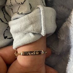 Introducing our real gold personalized baby bracelets, the perfect keepsake for your little one. These bracelets are made of genuine 14K gold, ensuring durability and longevity. The delicate design is perfect for babies and will be a cherished gift for years to come. Personalize the bracelet with your baby's name, initials, or a special date, making it a one-of-a-kind piece. The adjustable chain allows for a comfortable fit as your baby grows. Give a gift that will be treasured forever with our Baby Boy Jewelry, Baby Boy Bracelet, Baby Bracelet Gold, Bracelet For Boys, Personalised Baby Bracelet, Sweet Baby Names, Push Present, Baby Life Hacks, Baby Momma